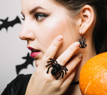 woman-with-bats-pumpkin