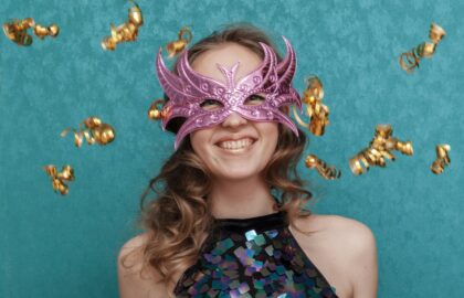 happy-woman-with-pink-mask-medium-shot