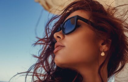 portrait-woman-with-red-hair-sunglasses