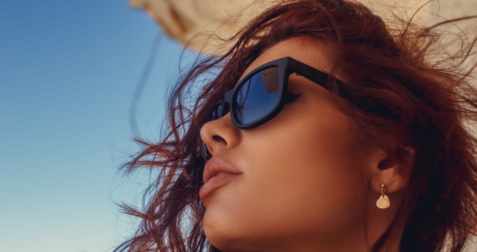 portrait-woman-with-red-hair-sunglasses